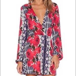 NBD X Naven Twins Deep V Neck Mayhem Dress.